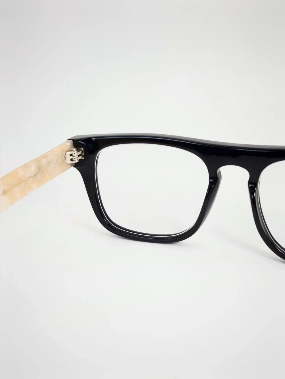 Fluoresce. Black Wayfarer-Style Eyeglasses with Pearl Temples.